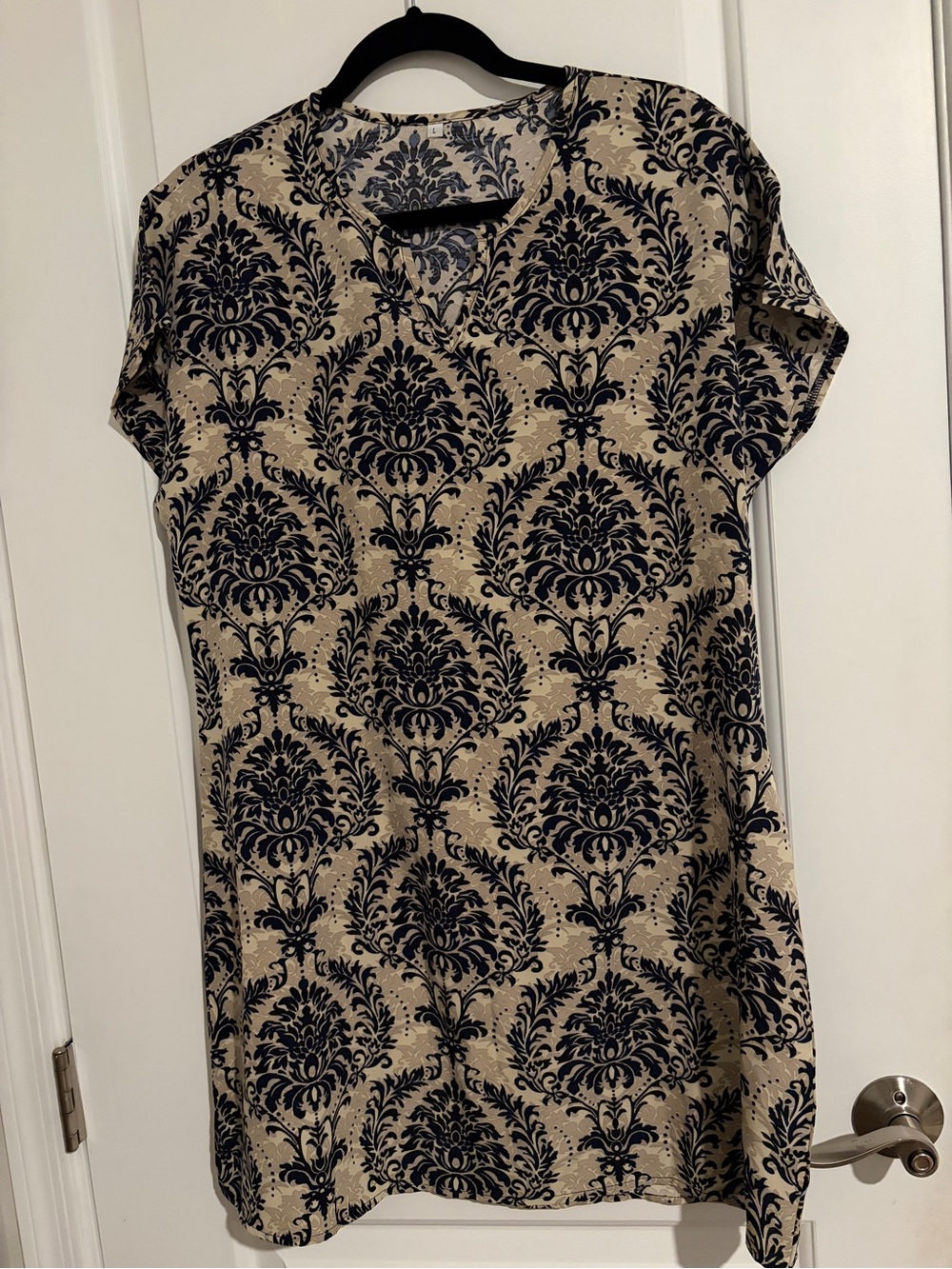 Large navy and tan dress with floral design print